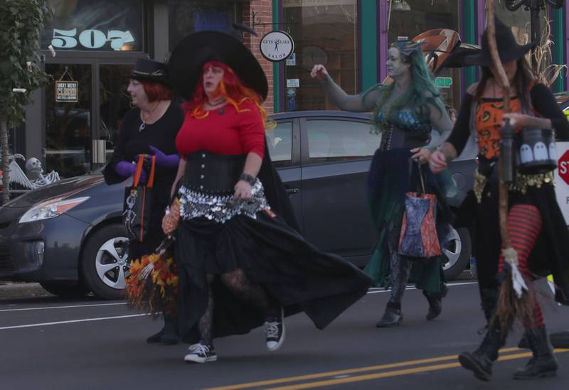 The Hocus Pocus Hags walk in the 6th annual Halloween parade on Saturday, Oct. 12, 2024 downtown Princeton.