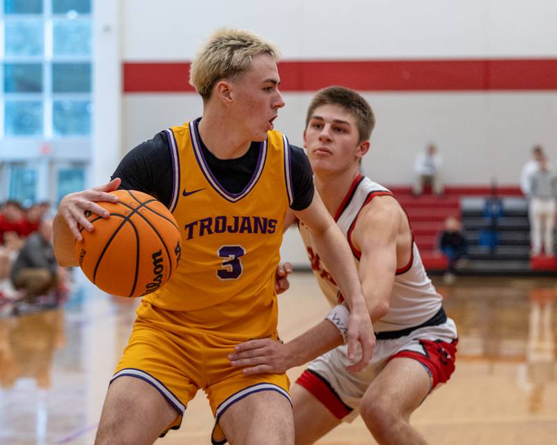 Alex Beetz (3) of Mendota maneuvers ball around Luke Bryant (4) of Hall in the championship game of the Colmone Classic on Saturday, December 20, 2025 at Hall High School in Spring Valley.