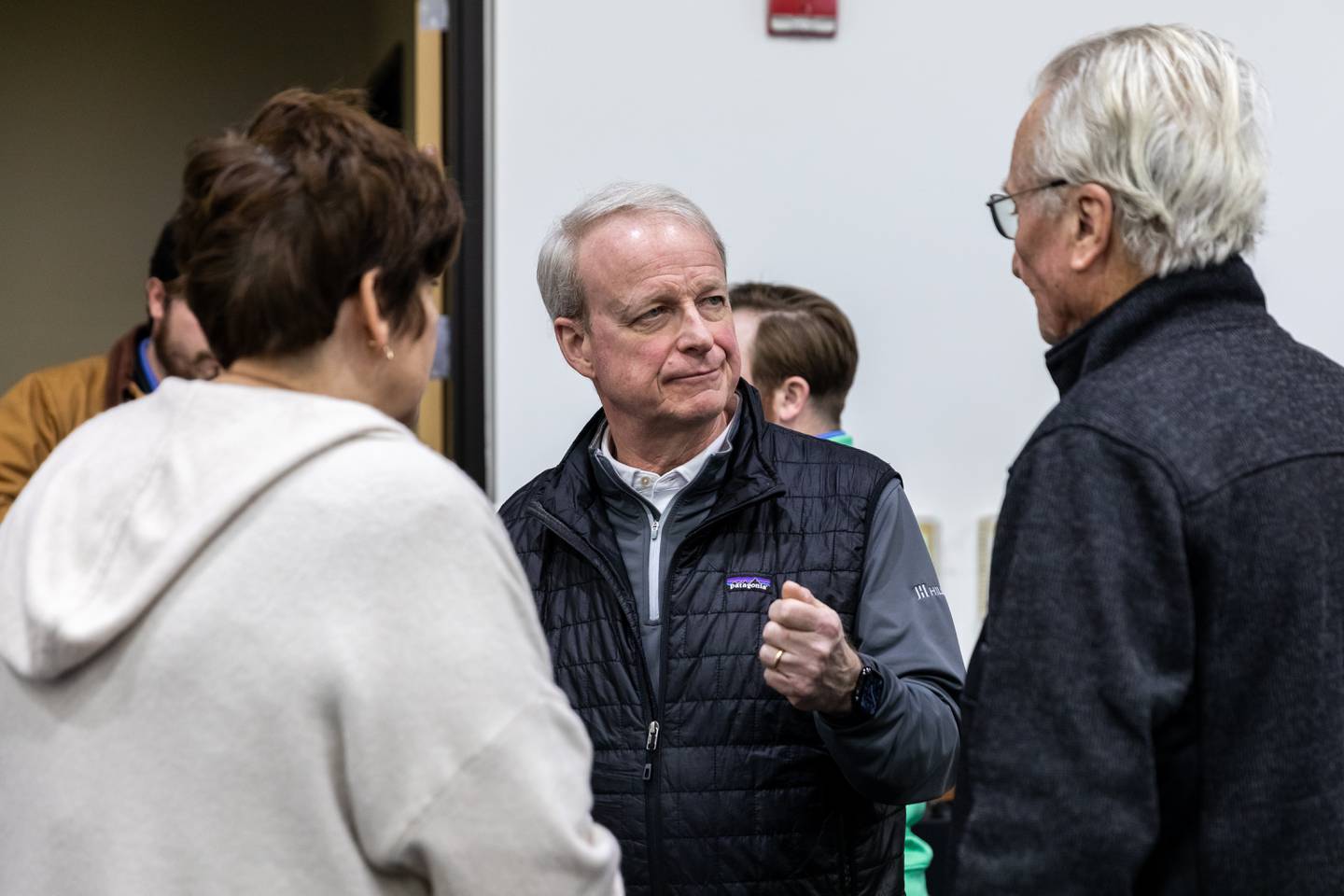 Donald Schoenheider of Hillwood chats with members of the community about the proposed Joliet Technology Center during an open house event at Joliet Community College on Feb. 12, 2026.