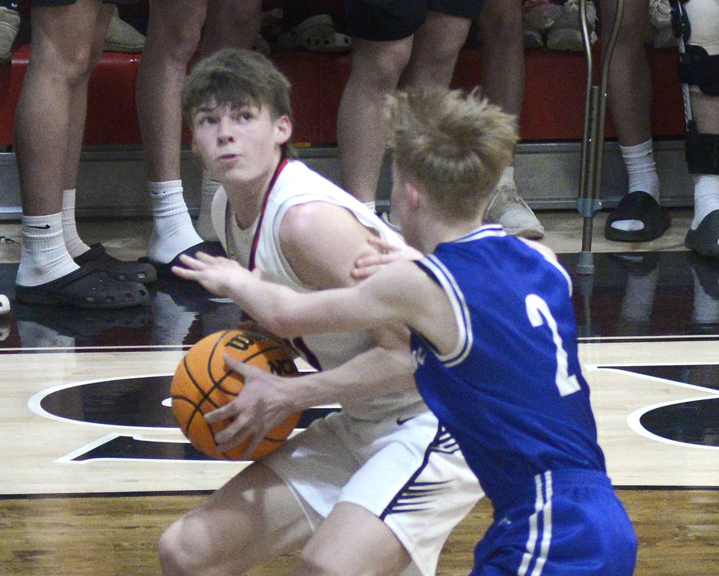 Woodland’s Nate Berry eyes the basket while trying to get past Newark’s Kellen Westerfield (2) during the Class 1A Woodland Regional championship game Friday, Feb. 27, 2026, in rural Streator.