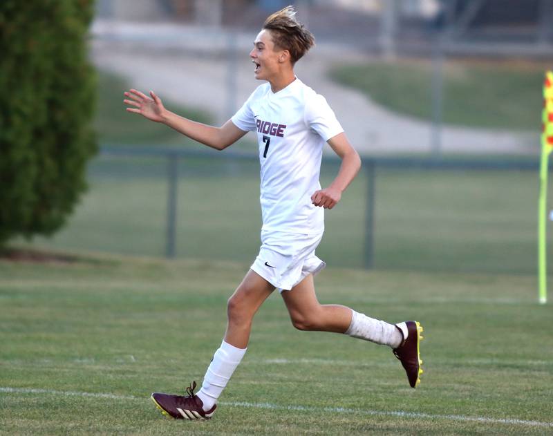 Prairie Ridge’s Alex Zinevich celebrates the Wolves’ first goal in varsity soccer at Jacobs High School in Algonquin on Thursday, Sept. 18, 2025.