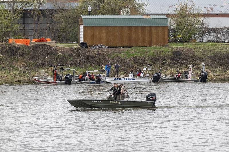 Search squads check the Rock River in Dixon Tuesday, April 14, 2026, after an individual jumped over the railing off of the Peoria Avenue Bridge late Monday night.