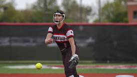 Yorkville’s Bella Rosauer, Oswego’s Jaelynn Anthony clutch in relief as game suspended in the 12th, tied 3-3