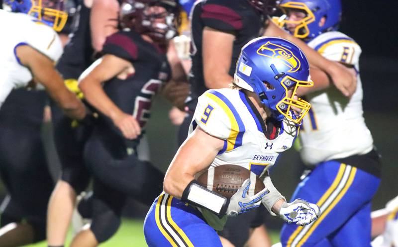 Johnsburg’s CJ Jones runs the ball in varsity football at Rod Poppe Field on the campus of Marengo High School in Marengo on Friday, Oct. 3, 2025.