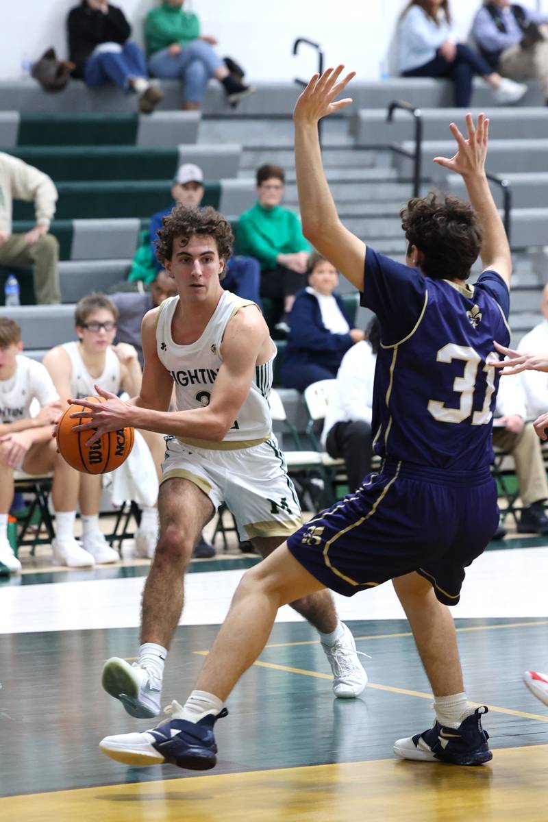 Bishop McNamara's Preston Payne looks to pass during the Fightin' Irish's 62-25 victory over Chesterton Academy on Wednesday, Jan. 7, 2026.