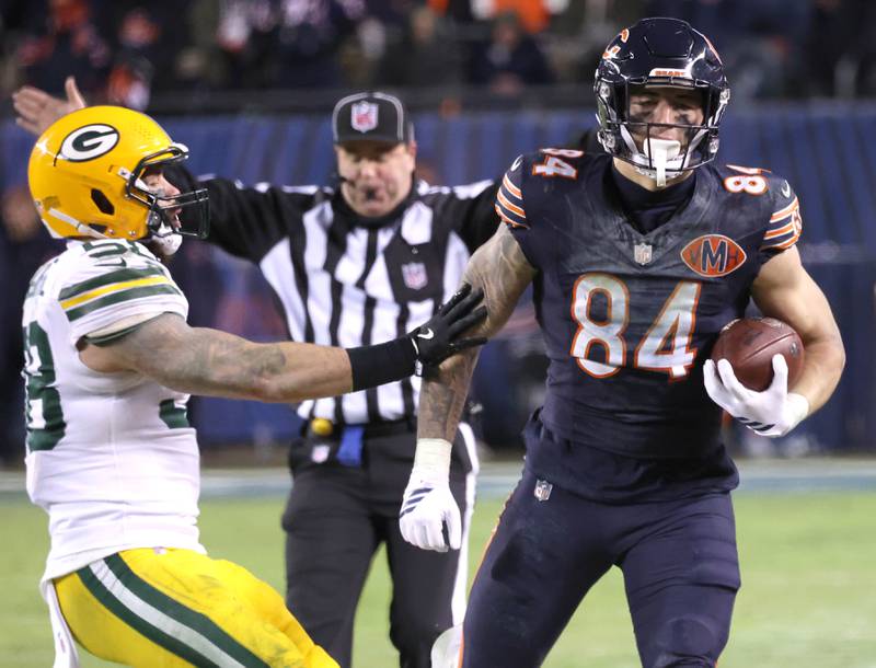 Chicago Bears tight end Colston Loveland is pushed out of bounds by Green Bay Packers linebacker Isaiah McDuffie during their NFL Wild Card game Saturday, Jan. 10, 2026, at Soldier Field in Chicago.