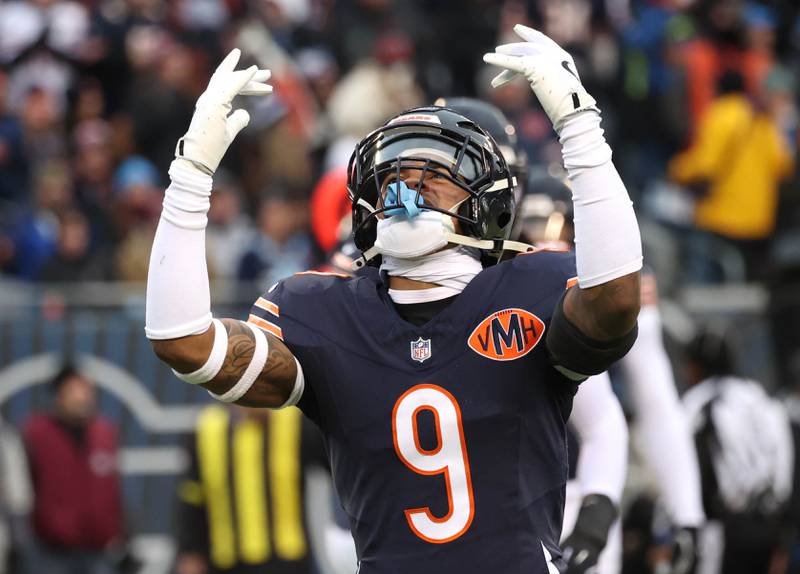Chicago Bears safety Jaquan Brisker tries to get the crowd behind the defense during their game against the Detroit Lions Sunday, Jan. 4, 2026, at Soldier Field in Chicago.