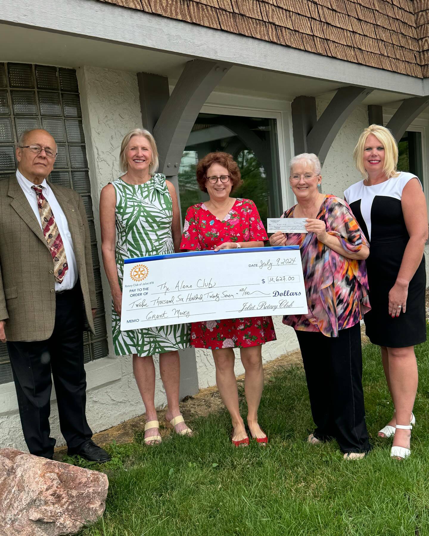 The Rotary Club of Joliet donated $12,000 to the Alano Club of Joliet, which holds Alcoholics Anonymous, Narcotics Anonymous and Al-Anon meetings among many other support groups, to provide part of a new roof and a sign to identify the new building where they hold meetings. Pictured are (from left) Rotarians Pete Paros, Diane Cepela, Mary Kay Sheehan Alano Club’s Board Secretary, Kallan Dee Elias, and Rotarian Tracy Simons.