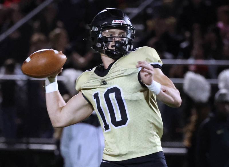 Sycamore's Burke Gautcher has time to find a receiver in the Ottawa secondary during their game Friday, Sept. 27, 2024, at Sycamore High School.