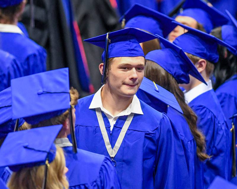 A St. Charles North student awaits the start of the graduation ceremony on Monday May 18, 2026, held at the NIU Convocation Center in DeKalb.