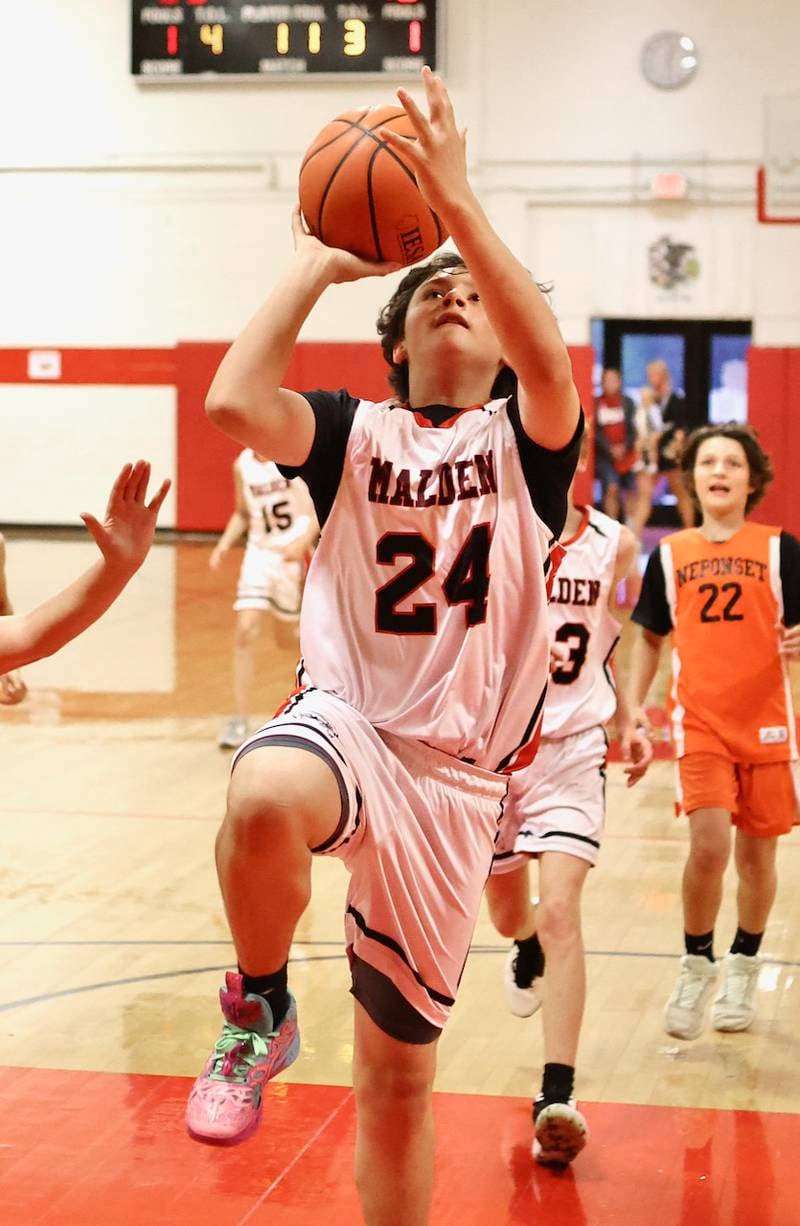 Malden's Jase Perez shoots a layup against Neponset in Wednesday's game at the Malden Tournament. The Musketeers won 31-13.