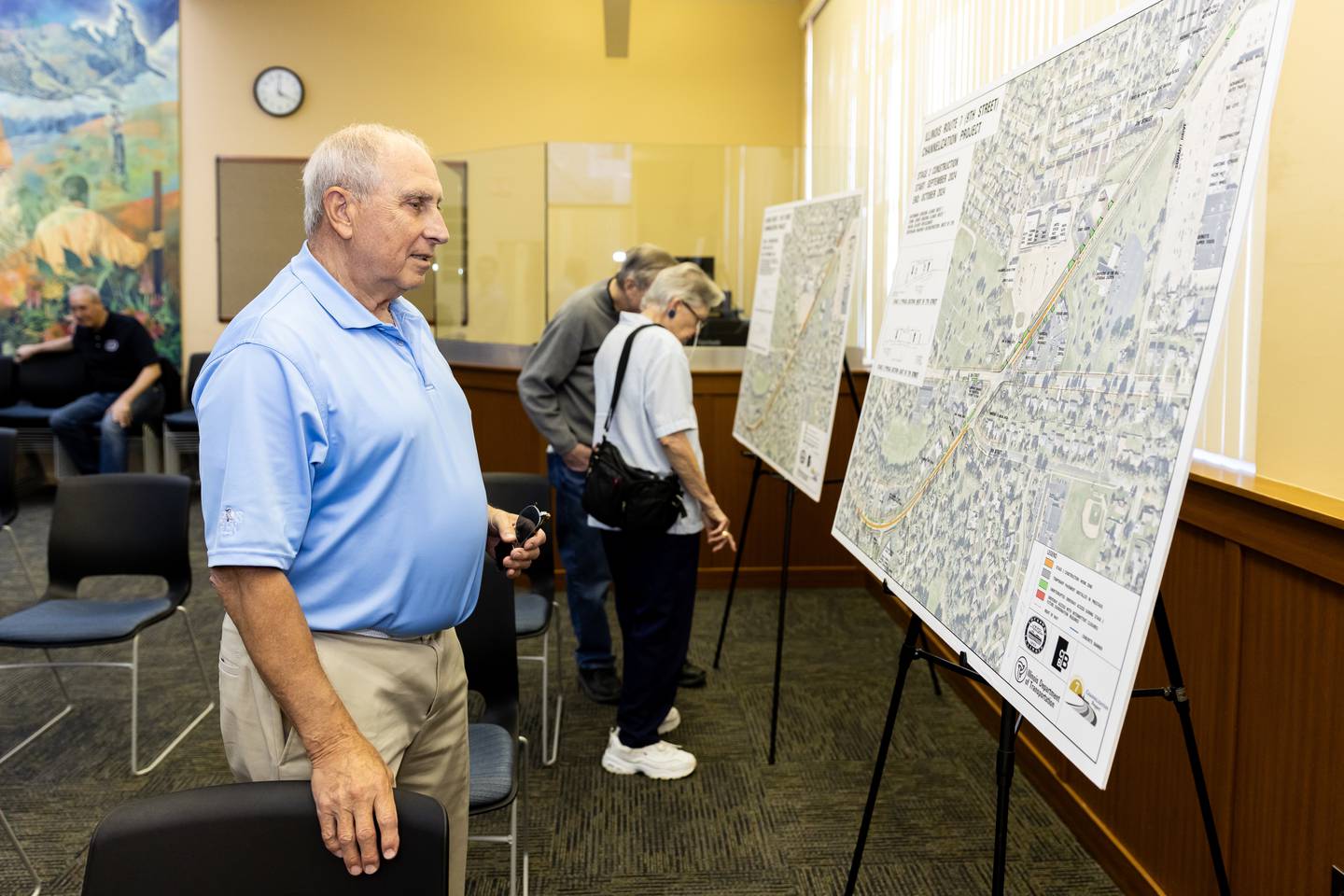 Jack Pastore (Lockport) looks at plans regarding the Illinois Route 7 Channelization Project during the pre-construction open house at Lockport City Hall on April 15, 2024.