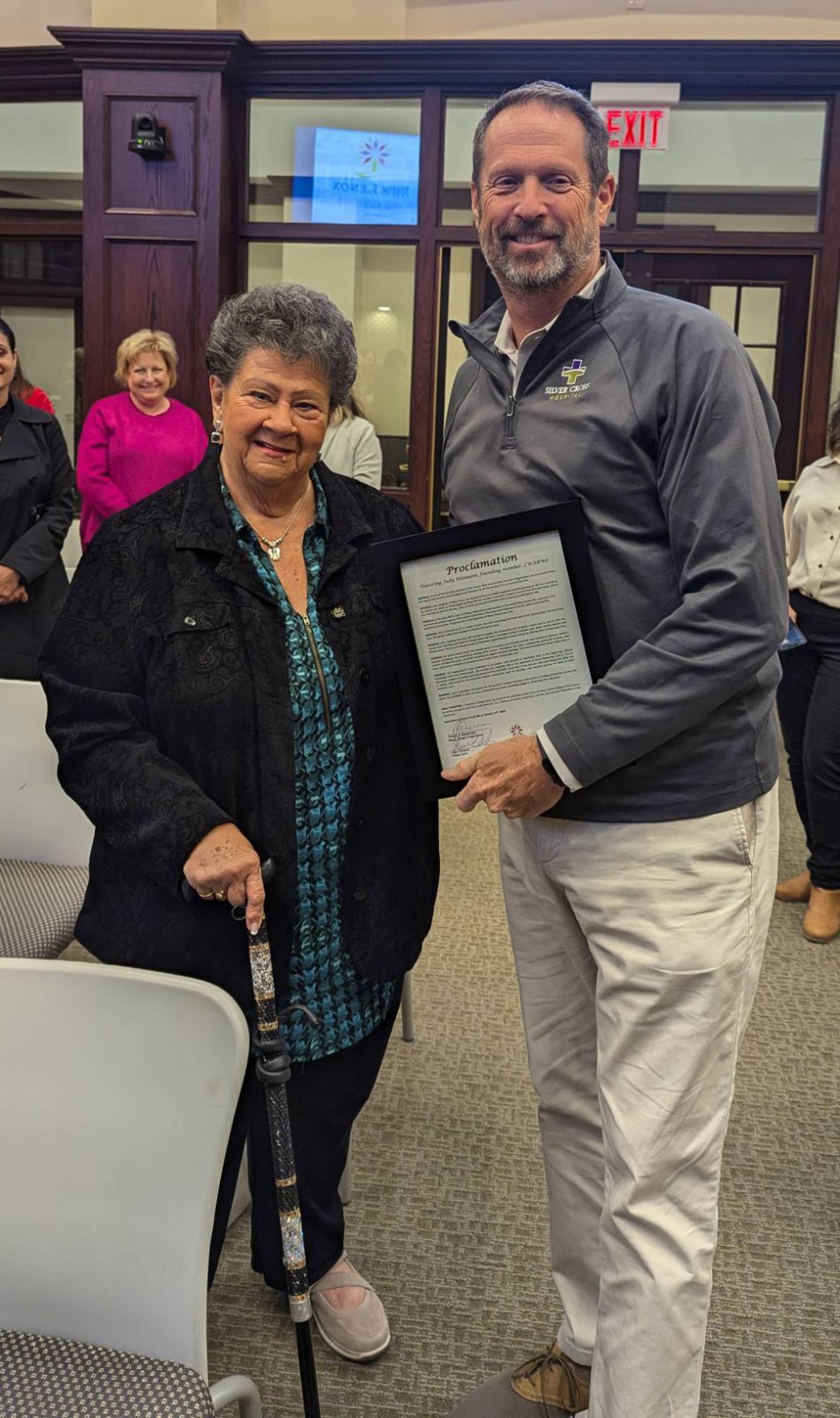 Tim Baldermann, mayor of New Lenox, honored Judy Niemann, a founder of the Lincoln-way Area Business Women’s Organization with a proclamation a crystal plaque at a recent New Lenox Chamber of Commerce meeting.