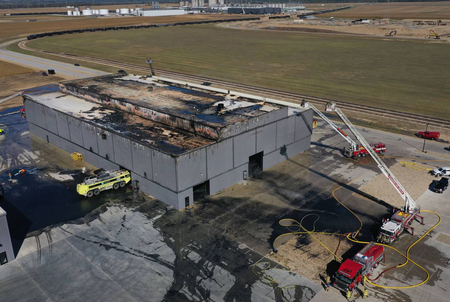 Firefighters work the scene of a structure fire on Wednesday, Oct. 8, 2025 at Marquis Energy in Hennepin. The fire was upgraded to a 5th alarm dispatching the (MABAS) Mutual Aid Box Alarm System. The fire broke out around 11a.m.