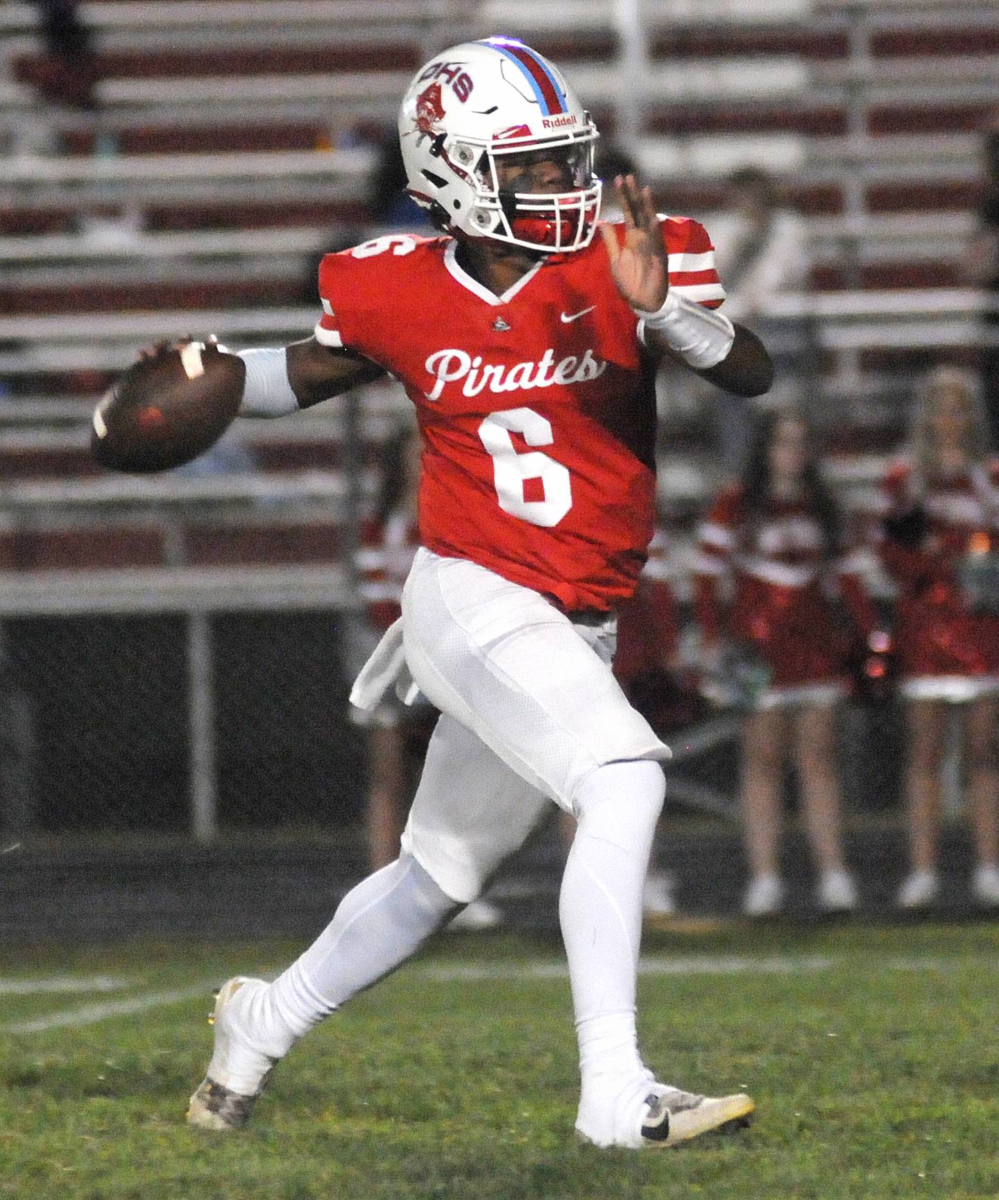 Ottawa quarterback Colby Mortensen prepares to throw a pass at King Field on Friday, Sept. 8, 2023.