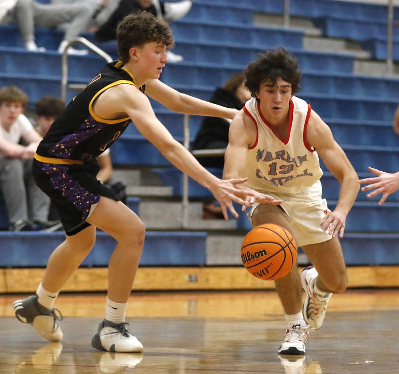 Marian Central's Adam Wrzos tries to drive to the basket against Chicago Christian's Casey Lenarz during a Chicagoland Christian Conference basketball game on Tuesday, Jan. 21, 2025, at Marian Central High School.