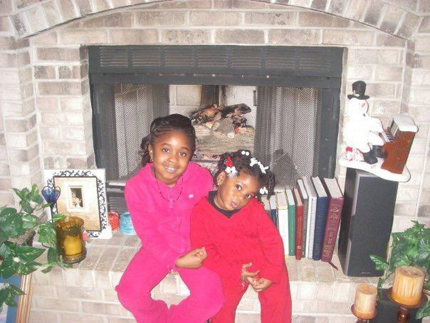 Dykota Morgan, 15, of Bolingbrook was an athlete, artist, activist and scholar. She died of complications from COVID-19 on May 4. She is pictured in her younger years with her older sister Dyman.