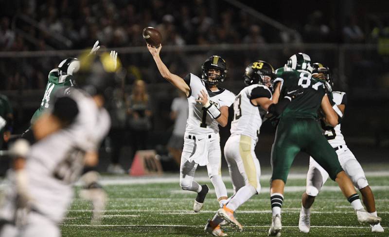 Graylake North's Jacob Donohue passes in a football game at Grayslake Central on Friday, September 10, 2021.