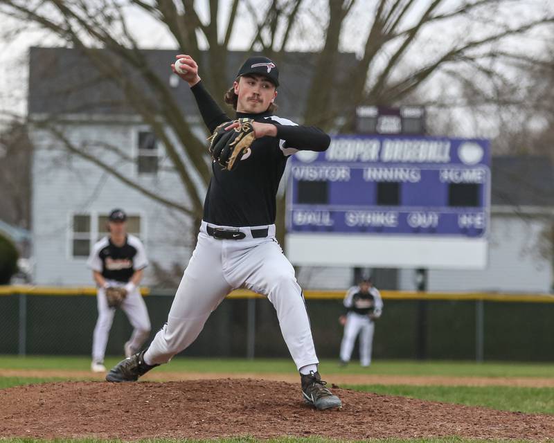 Sandwich's Braden Behringer (18) delivers to the plate during baseball game between Sandwich at Plano on Thursday, April 9, 2025 in Plano.