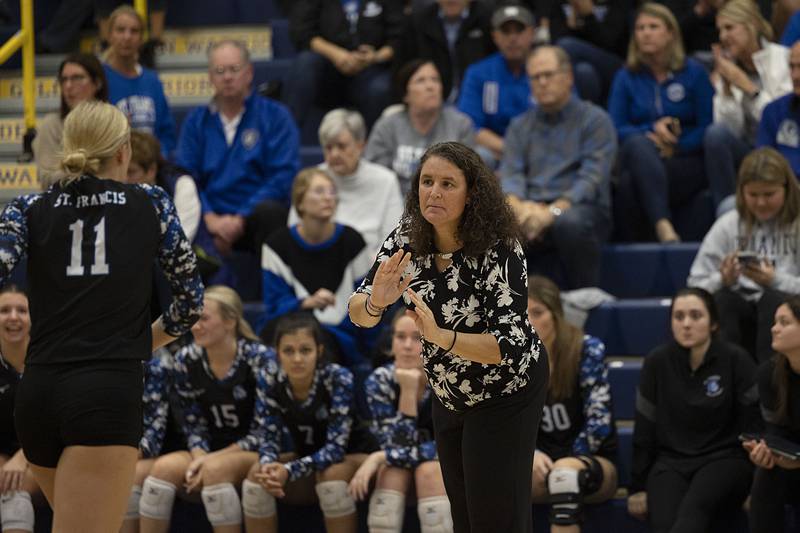 St. Francis’ head coach Lisa Ston works the sidelines Friday, Nov. 4, 2022 during the Spartan’s 3A supersectional game against Metamora.