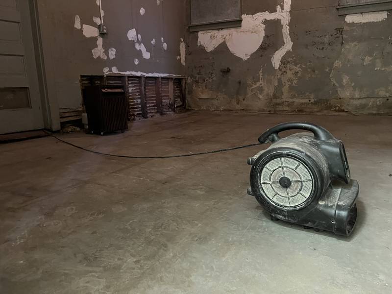 On Aug. 24, 2022 a fan works to dry a vacated room in the DeKalb Area Women's Center after a flood inundated the center's basement with seven inches of water at the beginning of the month.
