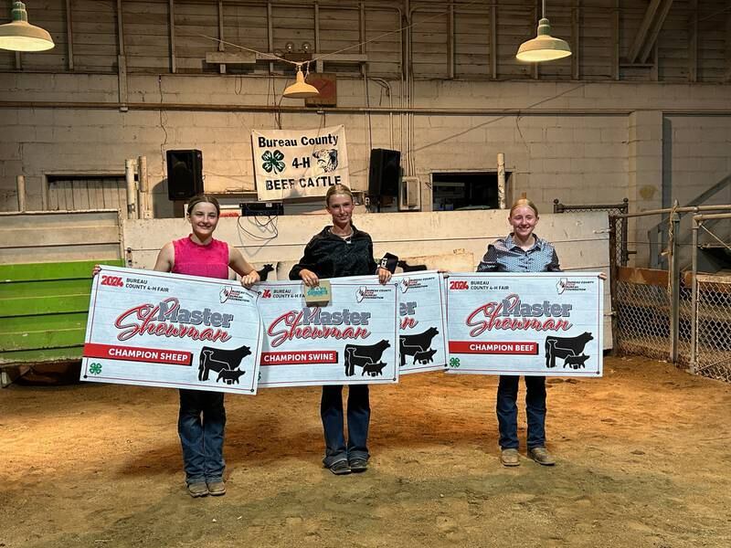 2024 Master Showmanship competitors braved the heat at this year’s 4-H Fair.  They are (from left) Lydia Hardy,  Champion Sheep Showman; Payton Frueh, Champion Swine Showman and Master Showmanship winner; and Carly Wiggin, Champion Cattle Showman and Reserve Master Showman.