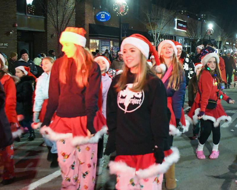 Members of the Lovv Dance Studio preform on Friday Nov. 24, 2023, during the holiday parade held in downtown Wheaton.