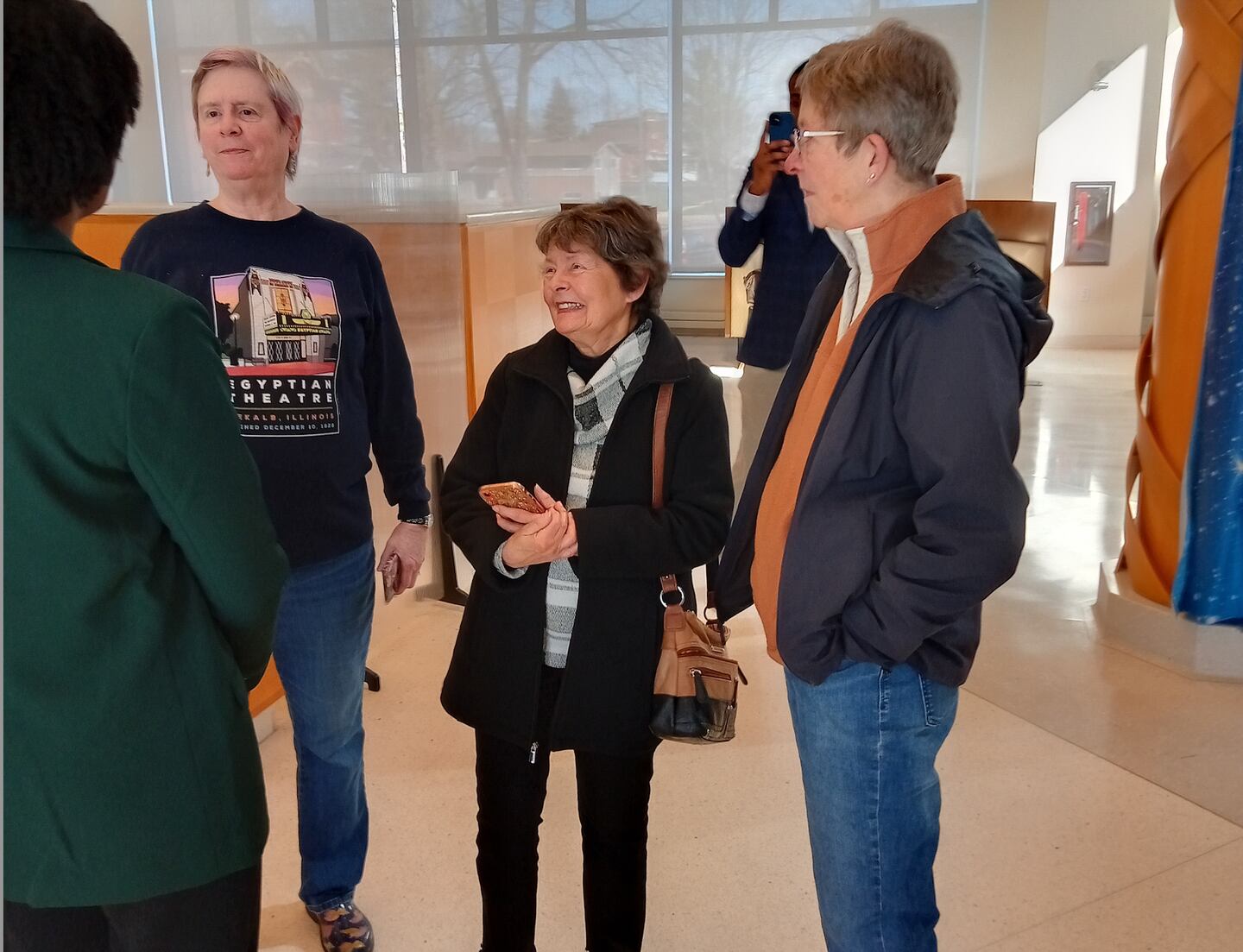 U.S. Rep. Lauren Underwood, D-Naperville, (left) talks with constituents who joined her Saturday, March 23, 2023,  at the DeKalb Public Library, 309 Oak St., to celebrate the 14th anniversary of the Affordable Care Act.