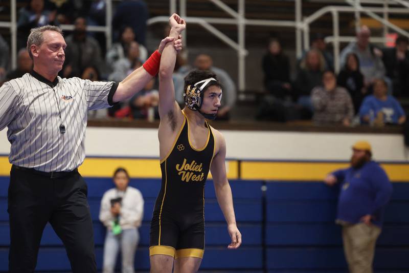 Joliet West’s Joseph Pedrosa defeats Joliet Central’s Aleck Allende in the -pound weight match at Joliet Central on Friday, Jan 31, 2025.