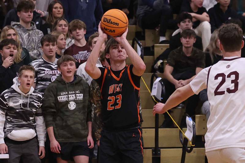 Lincoln-Way West’s Wyatt Carlson take the outside shot against Lockport on Friday, Dec. 6, 2024 in Lockport.