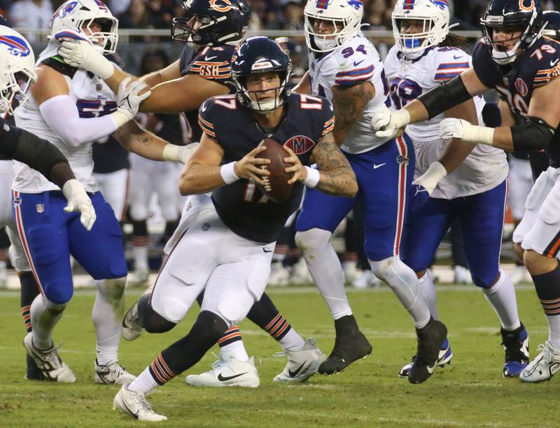 Chicago Bears quarterback Tyson Bagent,  scrambles to pick up a few extra yards against the Buffalo Bills on Sunday, Aug. 17, 2025 at Soldier Field in Chicago.