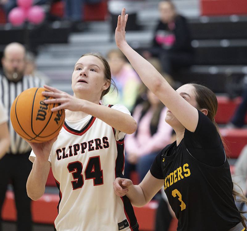 Amboy’s Bella Yanos puts up a shot against AFC’s Allie Prior Tuesday, Jan. 27, 2026.