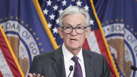 Federal Reserve keeps interest rate unchanged, sees slower growth, slightly higher inflation ahead