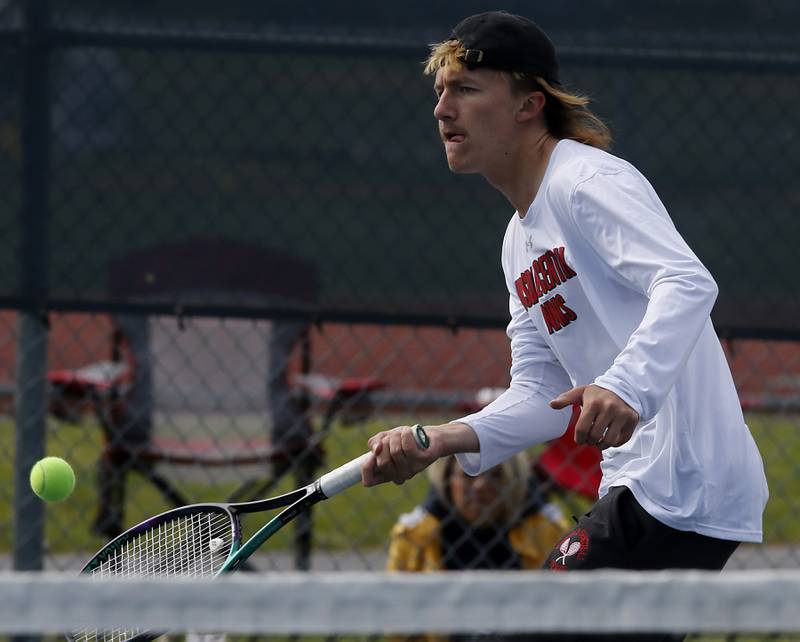 Hinsdale Central's James Theriault returns the ball during an IHSA 2A boys doubles tennis match Thursday, May 25, 2023, at Buffalo Grove High School.