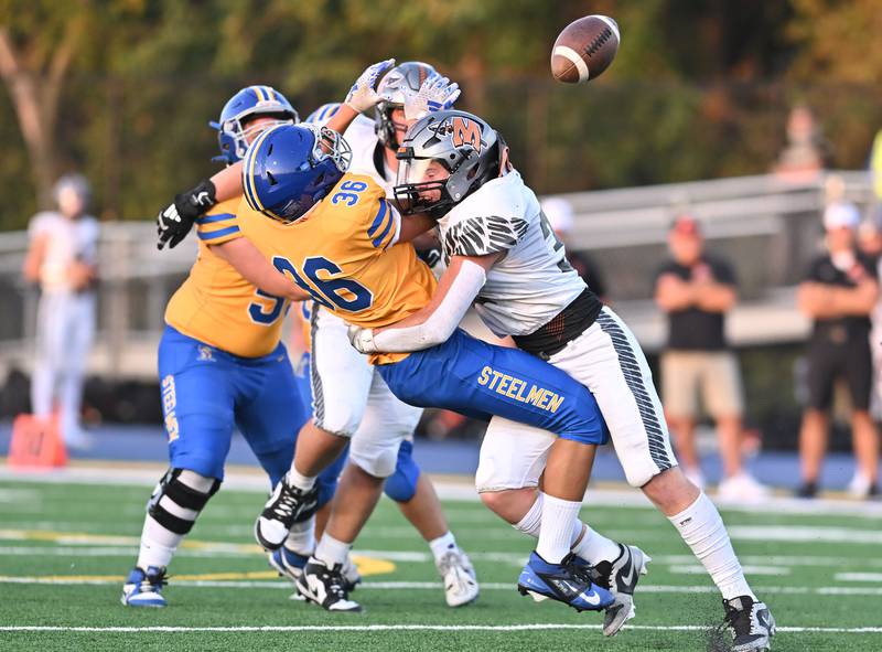 Minooka's Elliott Dahlberg puts a big hit on Joliet Central's Jeffrey Grimes during a non-conference game on Friday, Sep 13, 2024 at Joliet. (Dean Reid for Shaw Local News Network)