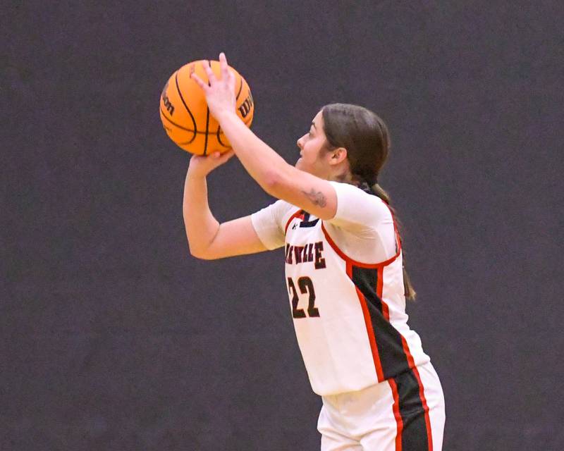 Yorkville's Sydney McCabe (22) makes a three-point basket on Thursday Dec. 18, 2025, during the game against Oswego East held at Yorkville High School.