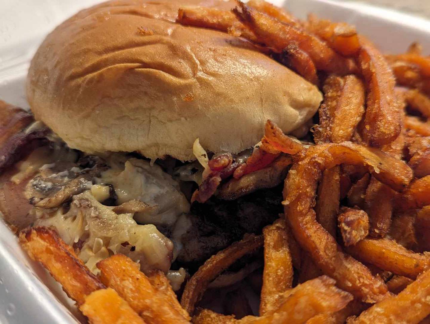The Dang Burger at the Southern Cafe in Crest Hill was a bacon mushroom burger with gouda cheese and remoulade sauce. A side order of sweet potato fries accompanied it.