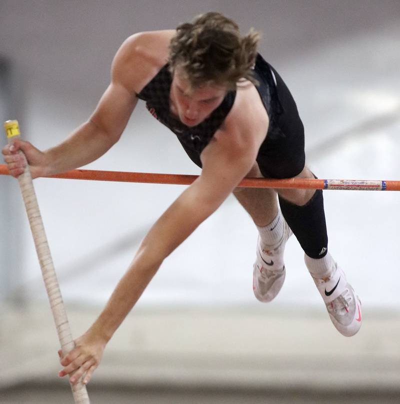 Huntley’s Jake Hill clears the bar in the pole vault in Fox Valley Conference boys track and field meet action at Huntley High School in Huntley on Thursday, May 15, 2025.
