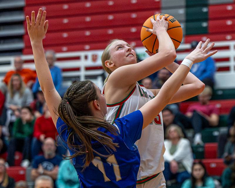 L-P's Margaret Boudreau (15) looks to shoot midrange shot as Princeton's Addy Dever guards on Saturday, Feb. 7, 2026 in Sellett Gymnasium at L-P High School.