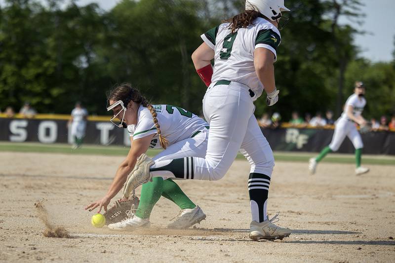 Rock Falls’ Katie Thatcher fields a ball against North Boone  Friday, May 19, 2023.