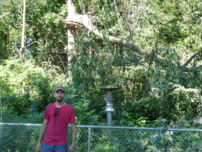 Crystal Lake resident Don Kersten, who was at home with his family on July 4, 2022, during a thunderstorm, shows off the damage behind his home believed to have been caused by a microburst.