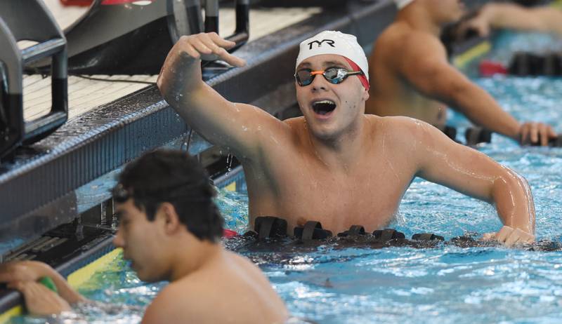 Hinsdale Central’s Joshua Bey celebrates his state-record breaking victory in the 100-yard breaststroke during the boys state swimming and diving finals at FMC Natatorium on Saturday, Feb. 24, 2024 in Westmont.