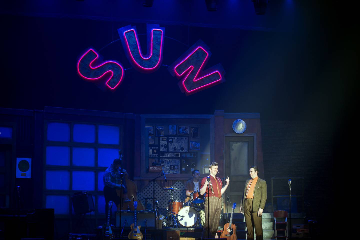 Lewis and Phillips act out a scene during the stage show “Million Dollar Quartet.”