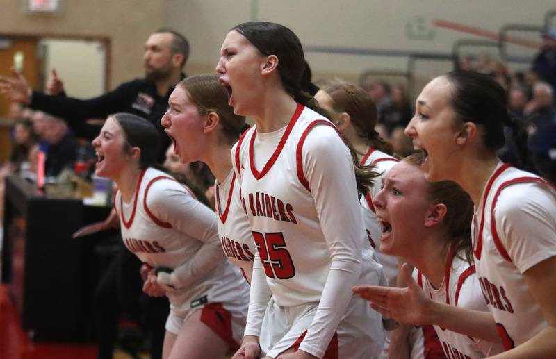 Huntley’s Red Raiders get revved up against Lake Zurich in IHSA Class 4A Sectional girls basketball action on Tuesday, Feb. 25, 2025, at Huntley High School in Huntley.