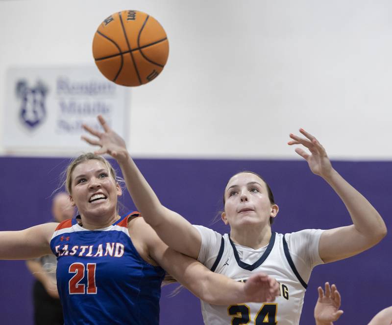 Sterling’s Madison Austin and Eastland’s Olivia Klinefelter fight for a ball Thursday, Dec. 26, 2024, during the Dixon Girls Holiday Basketball Tournament.