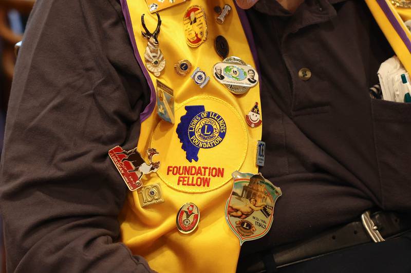 A Joliet Noon Lions Club member wears the club's vest at its afternoon meeting at the Silver Spoon restaurant on Thursday, Sept. 22, 2022, in Joliet. The Joliet Noon Lions Club, a community outreach organization, celebrated its 101st anniversary this year.