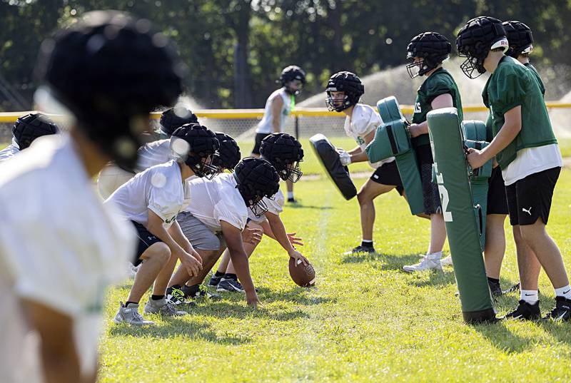 The Rock Falls football team lines up for drills Tuesday, Aug. 13, 2024. The Rockets face Byron on Aug. 30.