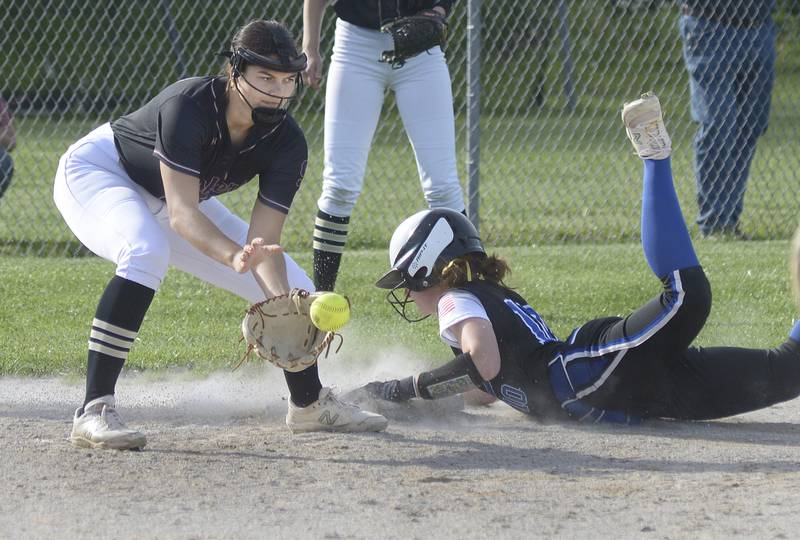 Serena third baseman Paisley Twait awaits the ball as Newark’s Stephanie Snyder gets in safely during one of the teams' regular-season Little Ten Conference showdowns this past season.