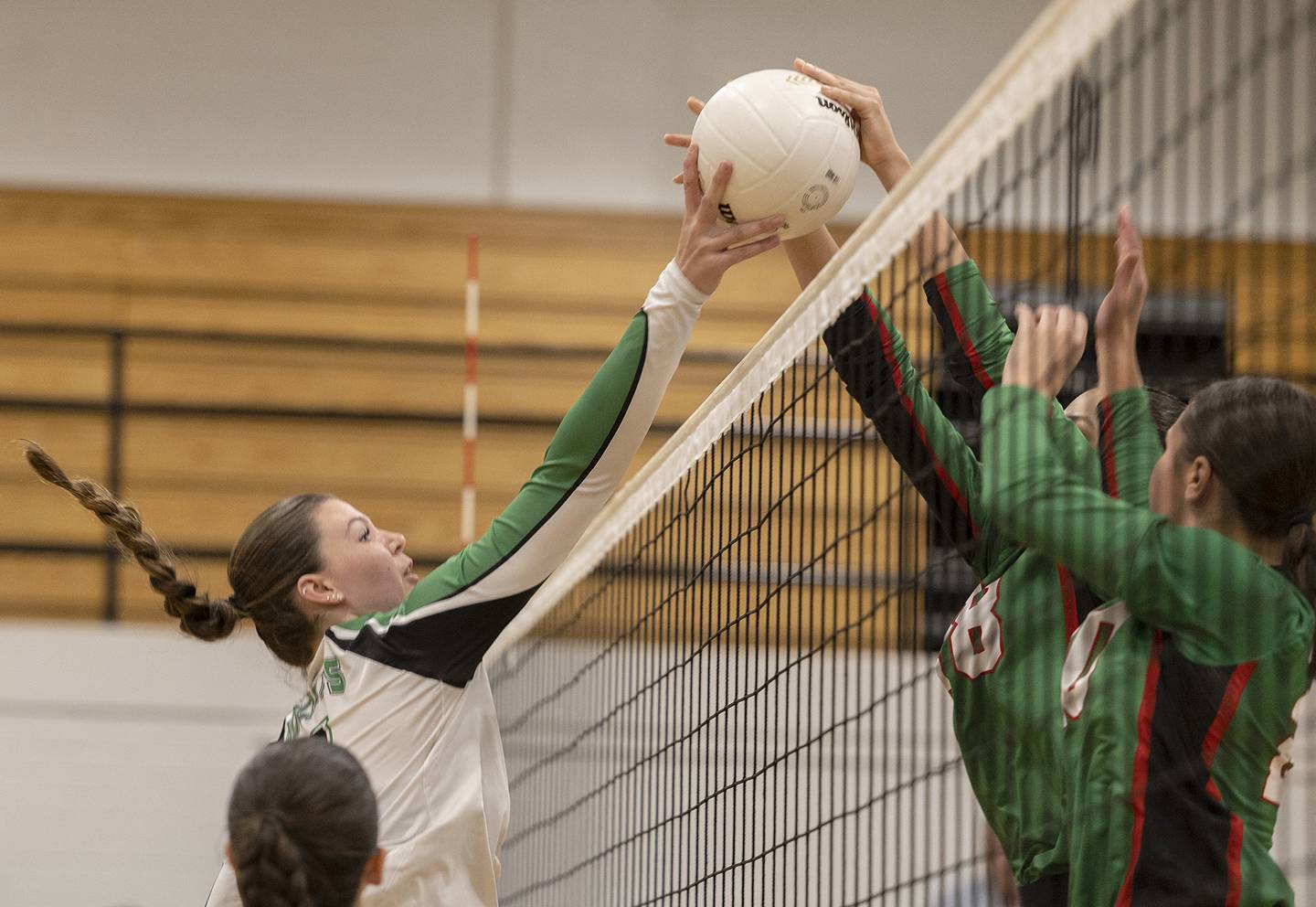 Rock Falls’ Addison Miller works against Lasalle-Peru’s Ava Currie Wednesday, Sept. 4, 2024, at Rock Falls High School.