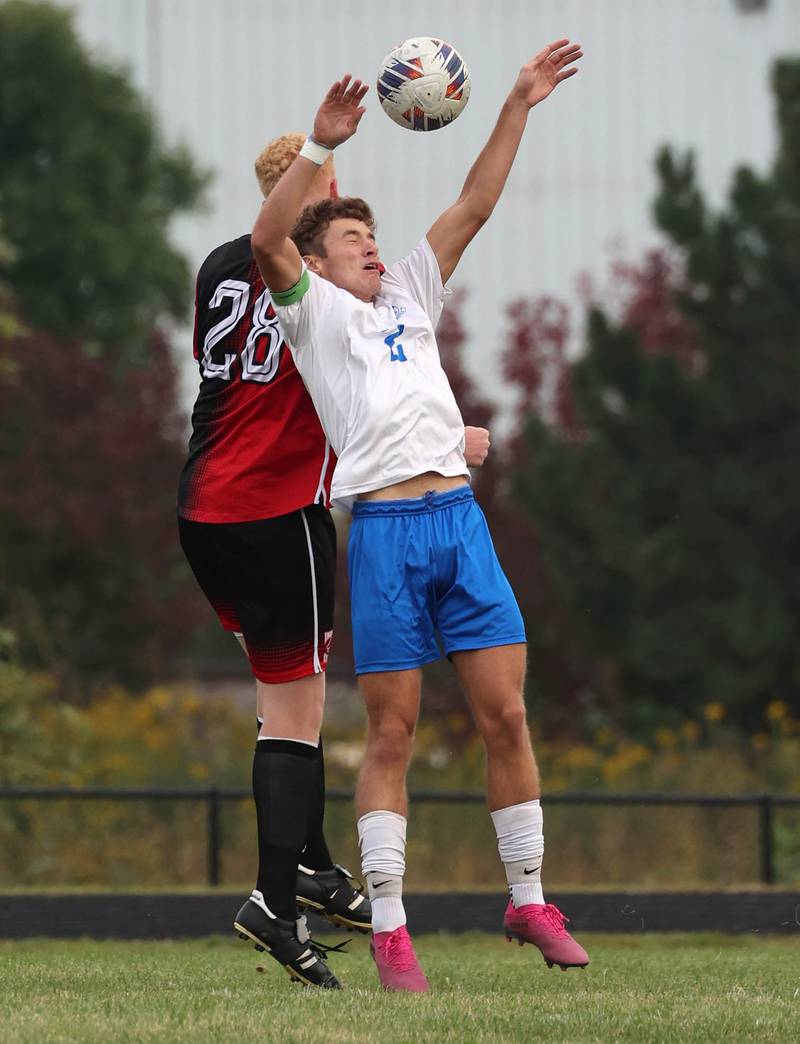 Hinckley-Big Rock's Tyler Smith (front) and Indian Creek's Isaac Willis go up for a header during their game Wednesday, Sept. 20, 2023, at Pack Park in Waterman.